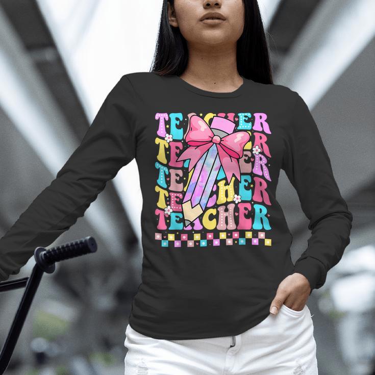 Groovy Teacher Cute Coquette Bow Flower Retro Back To School Women Long Sleeve T-Shirt, Groovy Teacher Shirts, gift for family, gift for coworker Groovy Teacher Cute Coquette Bow Flower Retro Back To School Women Long Sleeve T-Shirt, Groovy Teacher Shirts, gift for family, gift for coworker