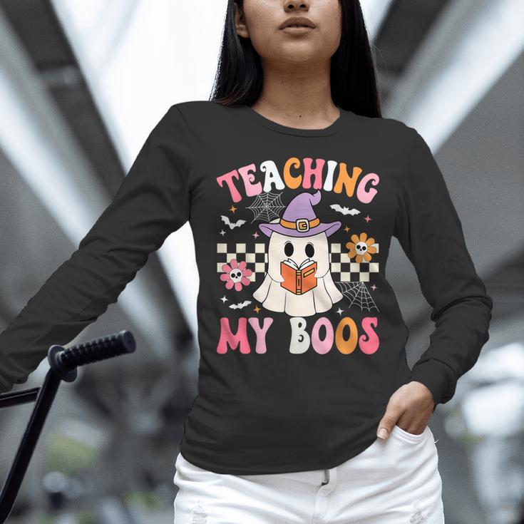 Groovy Teaching My Boos Teacher Ghost Halloween Teacher Women Long Sleeve T-Shirt, Groovy Teacher Shirts, gift for family, gift for coworker Groovy Teaching My Boos Teacher Ghost Halloween Teacher Women Long Sleeve T-Shirt, Groovy Teacher Shirts, gift for family, gift for coworker