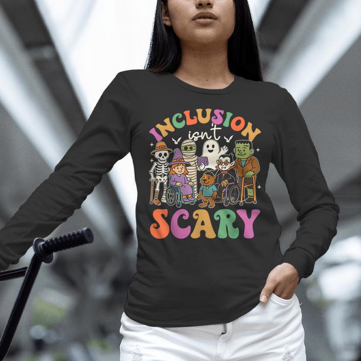 Inclusion Isnt Scary Halloween Skeleton Ghost Sped Teacher Women Long Sleeve T-Shirt, gift for family, gift for coworker Inclusion Isnt Scary Halloween Skeleton Ghost Sped Teacher Women Long Sleeve T-Shirt, gift for family, gift for coworker