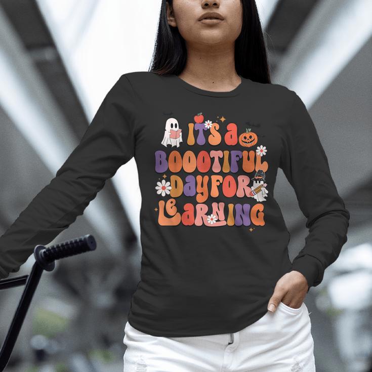 It's A Bootiful Day For Learning Cute Teacher Halloween Women Long Sleeve T-Shirt, gift for family, gift for coworker It's A Bootiful Day For Learning Cute Teacher Halloween Women Long Sleeve T-Shirt, gift for family, gift for coworker