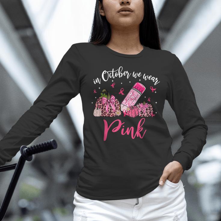 In October We Wear Pink Apple Teacher Daisy Breast Cancer Women Long Sleeve T-Shirt, gift for family, gift for coworker In October We Wear Pink Apple Teacher Daisy Breast Cancer Women Long Sleeve T-Shirt, gift for family, gift for coworker