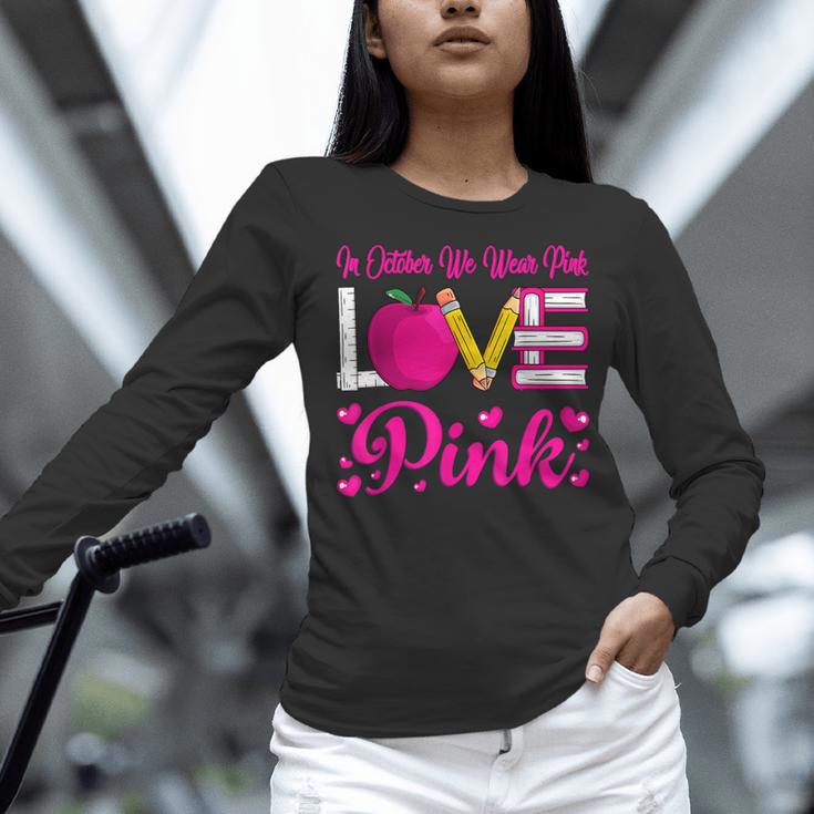 In October We Wear Pink Love Teacher Breast Cancer Awareness Women Long Sleeve T-Shirt, gift for family, gift for coworker In October We Wear Pink Love Teacher Breast Cancer Awareness Women Long Sleeve T-Shirt, gift for family, gift for coworker