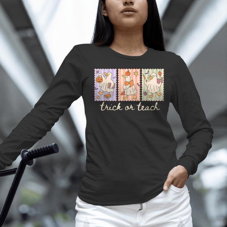 Preppy Goose Teacher Trick Or Teach Halloween Teacher Goose Women Long Sleeve T-Shirt, gift for family, gift for coworker