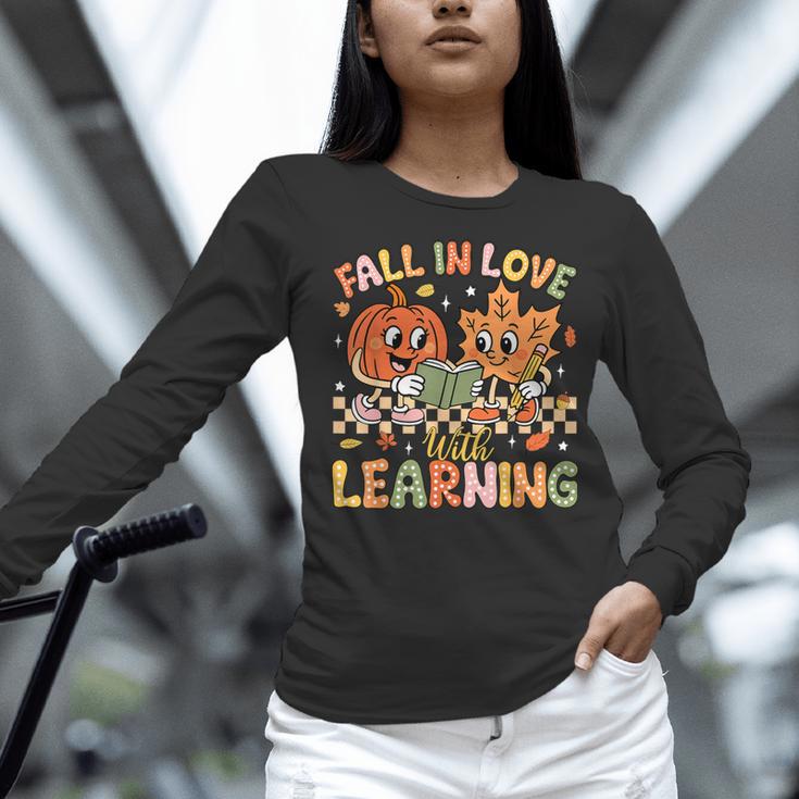 Retro Fall In Love With Learning Autumn Pumpkin Teacher Kids Women Long Sleeve T-Shirt, gift for family, gift for coworker