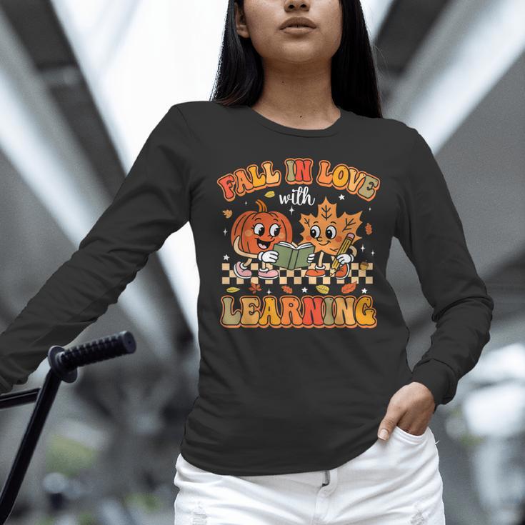 Retro Fall In Love With Learning Autumn Pumpkin Teachers Women Long Sleeve T-Shirt, gift for family, gift for coworker Retro Fall In Love With Learning Autumn Pumpkin Teachers Women Long Sleeve T-Shirt, gift for family, gift for coworker