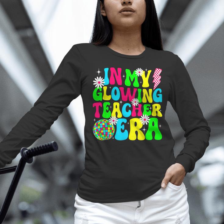Retro Groovy In My Glowing Teacher Era Happy Teacher's Day Women Long Sleeve T-Shirt, Groovy Teacher Shirts, gift for family, gift for coworker Retro Groovy In My Glowing Teacher Era Happy Teacher's Day Women Long Sleeve T-Shirt, Groovy Teacher Shirts, gift for family, gift for coworker