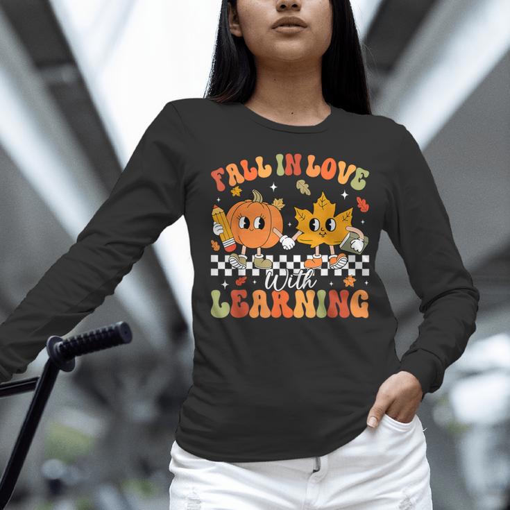 Retro Pumpkin Fall In Love With Learning Autumn Teacher Women Long Sleeve T-Shirt, gift for family, gift for coworker Retro Pumpkin Fall In Love With Learning Autumn Teacher Women Long Sleeve T-Shirt, gift for family, gift for coworker