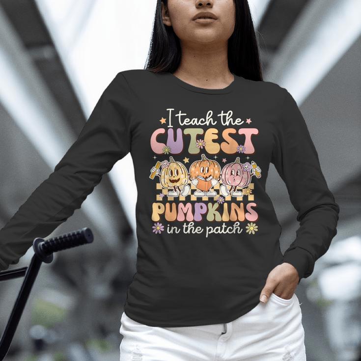I Teach The Cutest Pumpkins In The Patch Teacher Retro Women Long Sleeve T-Shirt, gift for family, gift for coworker I Teach The Cutest Pumpkins In The Patch Teacher Retro Women Long Sleeve T-Shirt, gift for family, gift for coworker
