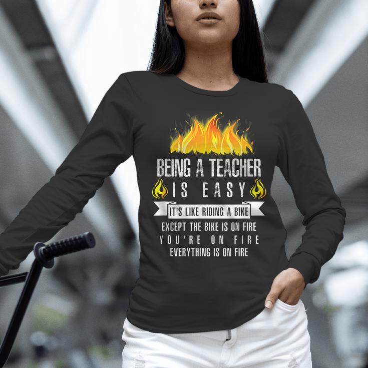 Being a Teacher Is Easy Everything Is On Fire T-Shirt For Men Women Kids Women Long Sleeve T-Shirt, gift for family, gift for coworker Being a Teacher Is Easy Everything Is On Fire T-Shirt For Men Women Kids Women Long Sleeve T-Shirt, gift for family, gift for coworker