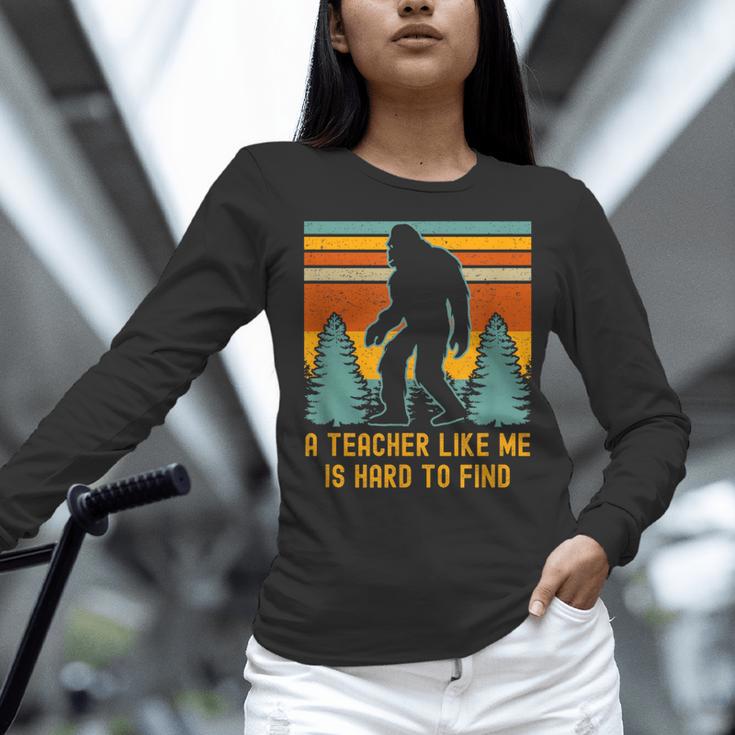 A Teacher Like Me Is Hard To Find Bigfoot Teacher Women Long Sleeve T-Shirt, gift for family, gift for coworker A Teacher Like Me Is Hard To Find Bigfoot Teacher Women Long Sleeve T-Shirt, gift for family, gift for coworker