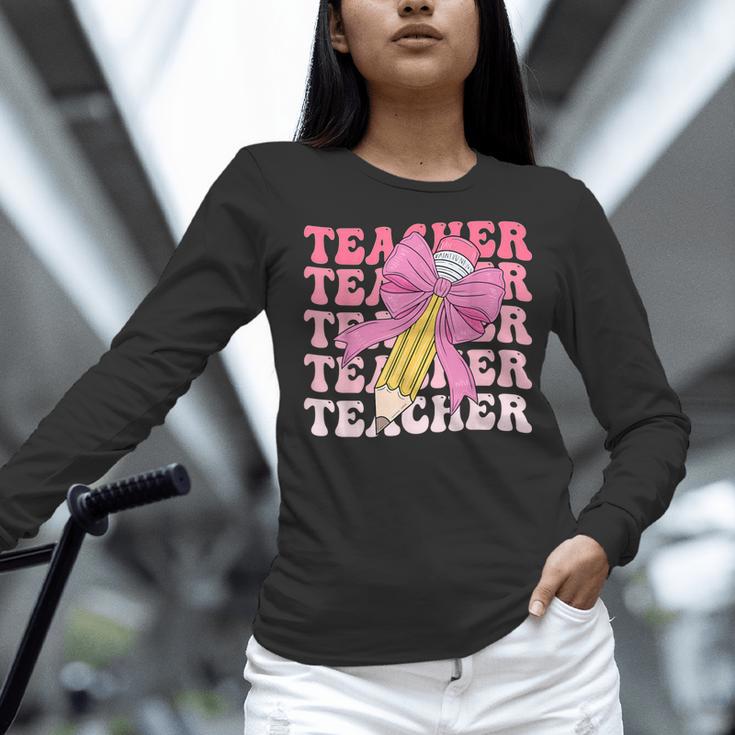 Teacher Pencil Back To School Groovy Pink Teacher First Day Women Long Sleeve T-Shirt, Groovy Teacher Shirts, gift for family, gift for coworker Teacher Pencil Back To School Groovy Pink Teacher First Day Women Long Sleeve T-Shirt, Groovy Teacher Shirts, gift for family, gift for coworker