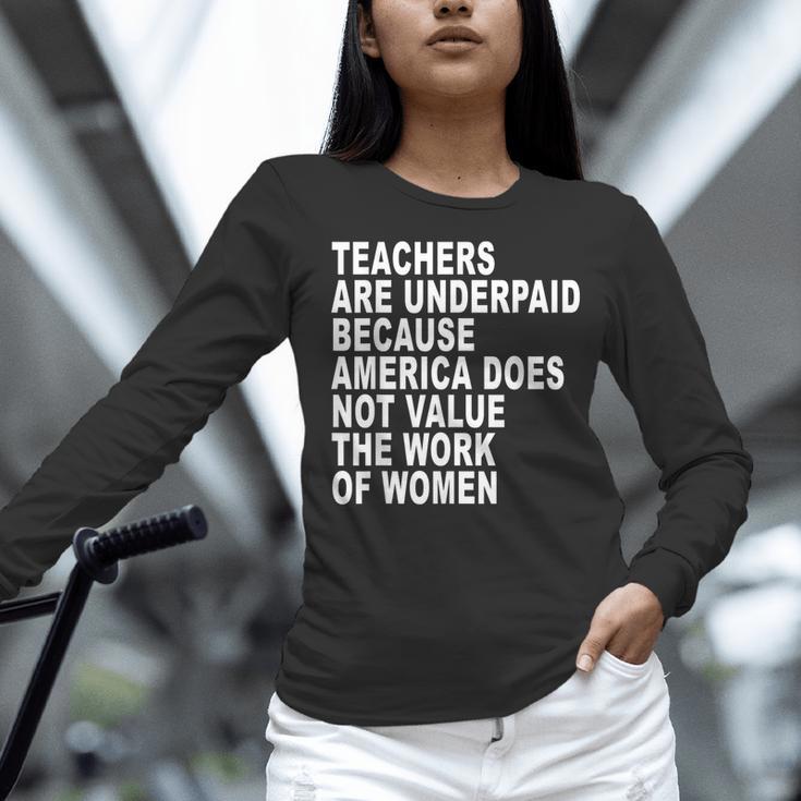 Teachers Are Underpaid Because America Does Not Value Men Women Women Long Sleeve T-Shirt, gift for family, gift for coworker Teachers Are Underpaid Because America Does Not Value Men Women Women Long Sleeve T-Shirt, gift for family, gift for coworker