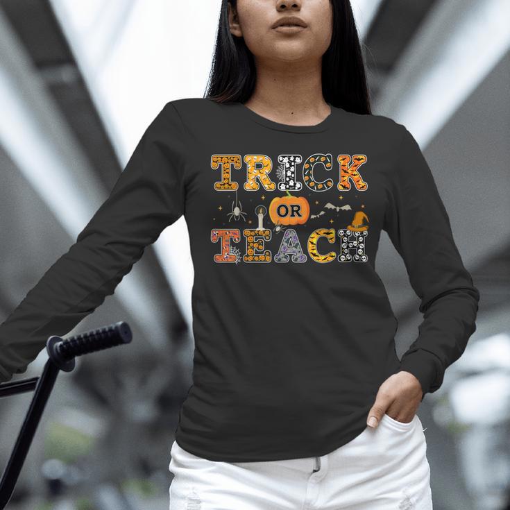 Trick Or Teach Funny School Teacher Halloween Costume Women Long Sleeve T-Shirt, gift for family, gift for coworker Trick Or Teach Funny School Teacher Halloween Costume Women Long Sleeve T-Shirt, gift for family, gift for coworker