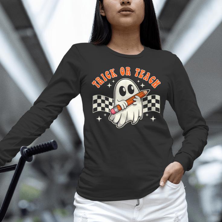 Trick Or Teach Groovy Retro Ghost Halloween Teacher Kids Women Long Sleeve T-Shirt, Groovy Teacher Shirts, gift for family, gift for coworker Trick Or Teach Groovy Retro Ghost Halloween Teacher Kids Women Long Sleeve T-Shirt, Groovy Teacher Shirts, gift for family, gift for coworker