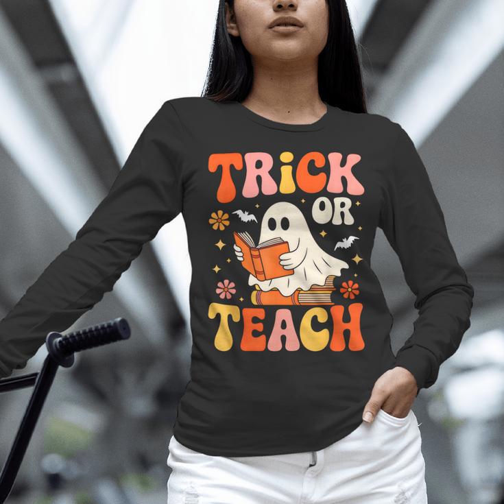 Trick Or Teach Halloween Shirt For Teacher Kids Floral Ghost Women Long Sleeve T-Shirt, gift for family, gift for coworker Trick Or Teach Halloween Shirt For Teacher Kids Floral Ghost Women Long Sleeve T-Shirt, gift for family, gift for coworker