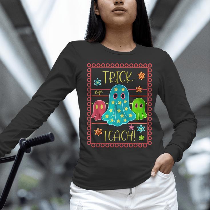 Trick Or Teach Neon Ghost Flower Teacher Spooky Halloween Women Long Sleeve T-Shirt, gift for family, gift for coworker Trick Or Teach Neon Ghost Flower Teacher Spooky Halloween Women Long Sleeve T-Shirt, gift for family, gift for coworker