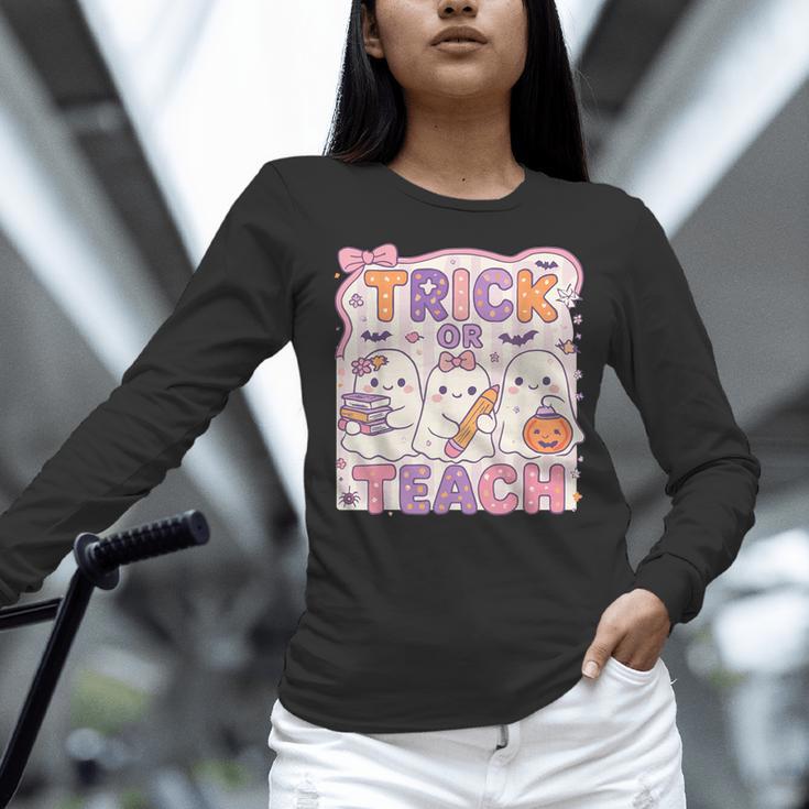 Trick Or Teach Retro Halloween Teacher Look Women Long Sleeve T-Shirt, gift for family, gift for coworker Trick Or Teach Retro Halloween Teacher Look Women Long Sleeve T-Shirt, gift for family, gift for coworker