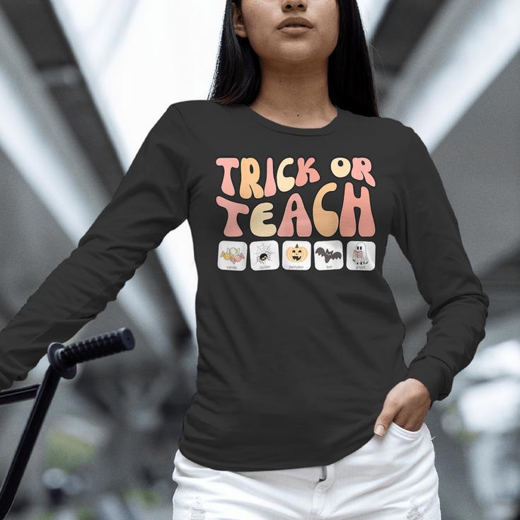 Trick Or Teach With Symbols Special Education Teacher Spooky Women Long Sleeve T-Shirt, gift for family, gift for coworker