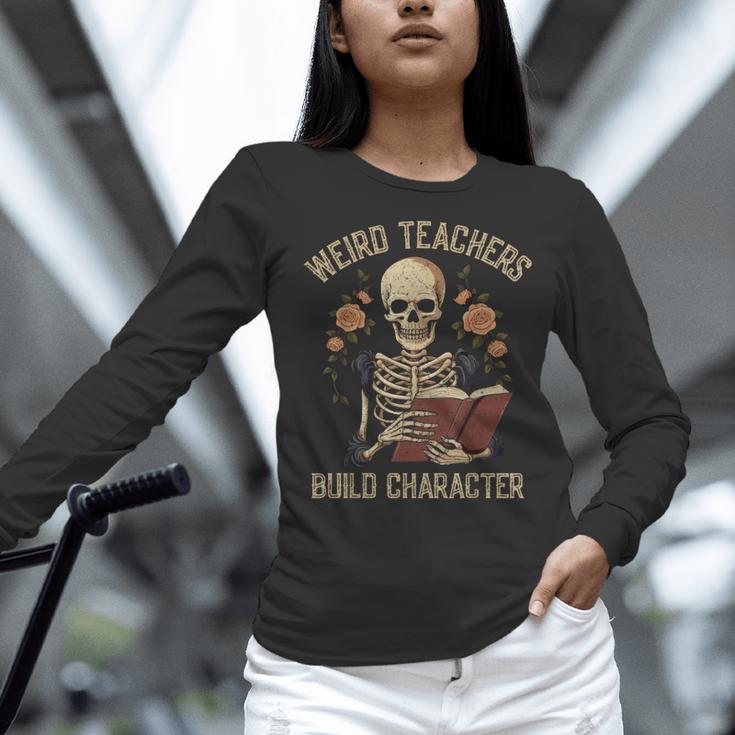 Weird Teachers Build Character Skeleton Book Halloween Women Women Long Sleeve T-Shirt, gift for family, gift for coworker Weird Teachers Build Character Skeleton Book Halloween Women Women Long Sleeve T-Shirt, gift for family, gift for coworker