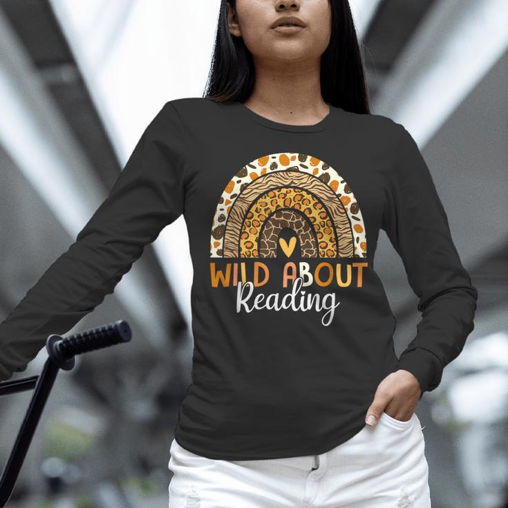 Wild About Reading Teacher Back To School Leopard Rainbow Women Long Sleeve T-Shirt, gift for family, gift for coworker