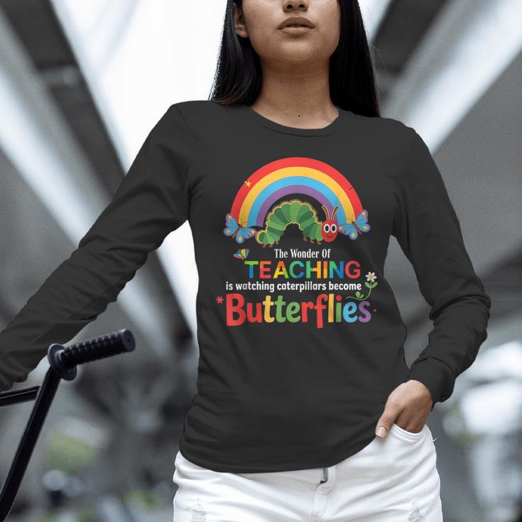 The Wonder Of Teaching Is Watching Caterpillars Teacher Women Long Sleeve T-Shirt, gift for family, gift for coworker