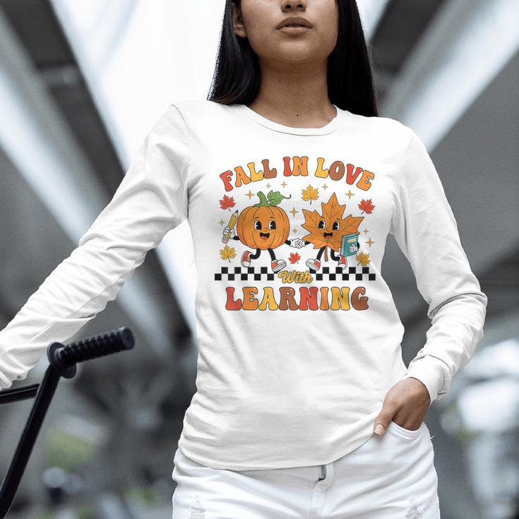 Fall In Love With Learning Teacher Student Autumn Pumpkin Women Long Sleeve T-Shirt, gift for family, gift for coworker Fall In Love With Learning Teacher Student Autumn Pumpkin Women Long Sleeve T-Shirt, gift for family, gift for coworker