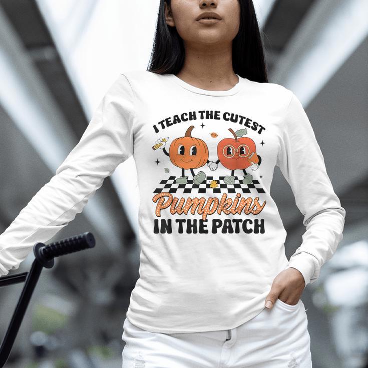 Groovy I Teach The Cutest Pumpkins In The Patch For Teacher Women Long Sleeve T-Shirt, Groovy Teacher Shirts, gift for family, gift for coworker Groovy I Teach The Cutest Pumpkins In The Patch For Teacher Women Long Sleeve T-Shirt, Groovy Teacher Shirts, gift for family, gift for coworker
