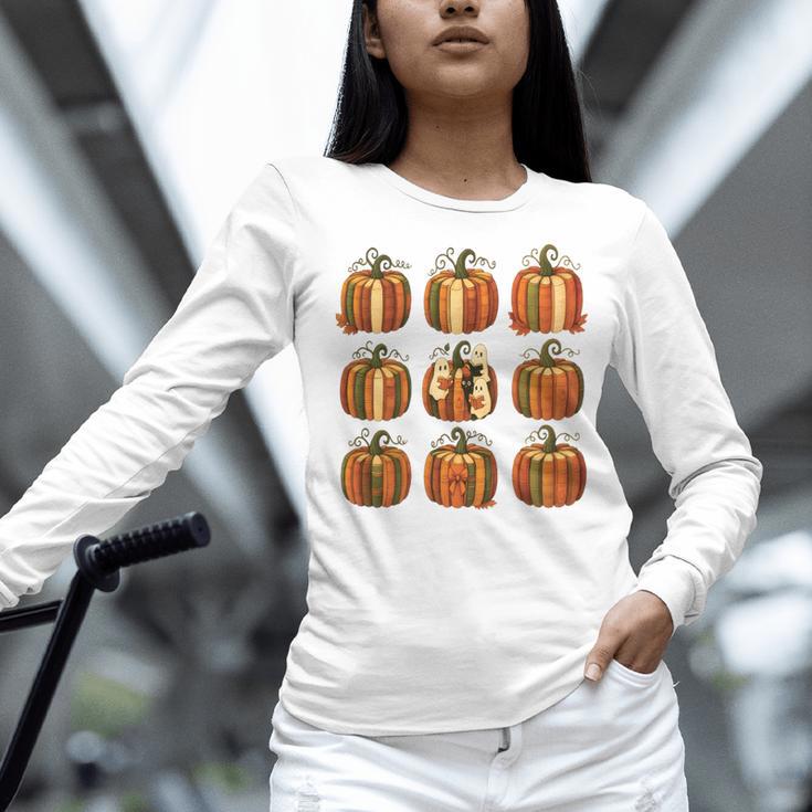 Halloween Teacher Fall Book Pumpkin Retro Reading Women Long Sleeve T-Shirt, gift for family, gift for coworker Halloween Teacher Fall Book Pumpkin Retro Reading Women Long Sleeve T-Shirt, gift for family, gift for coworker