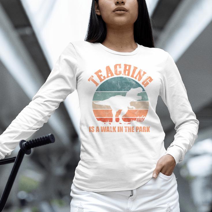 Teaching Is A Walk In The Park Teacher T-Rex Retro Women Long Sleeve T-Shirt, gift for family, gift for coworker