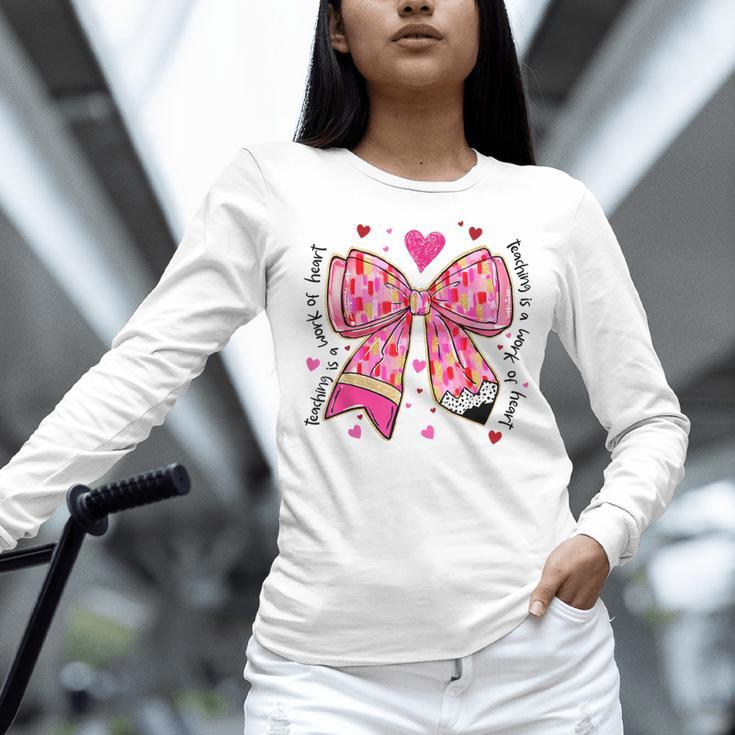 Teaching Is A Work Of Heart Pencil Bow Teacher Valentine Women Long Sleeve T-Shirt, gift for family, gift for coworker Teaching Is A Work Of Heart Pencil Bow Teacher Valentine Women Long Sleeve T-Shirt, gift for family, gift for coworker