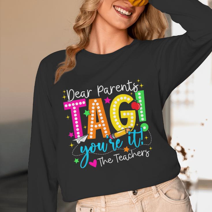 Dear Parents Tag You'Re It Love Teachers Last Day Of School Women Long Sleeve T-Shirt, novelty gifts, funny gifts Dear Parents Tag You'Re It Love Teachers Last Day Of School Women Long Sleeve T-Shirt, novelty gifts, funny gifts