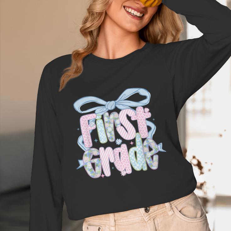 First Grade Coquette Bow Girls Teacher Team 1st Grade Squad Women Long Sleeve T-Shirt, novelty gifts, funny gifts