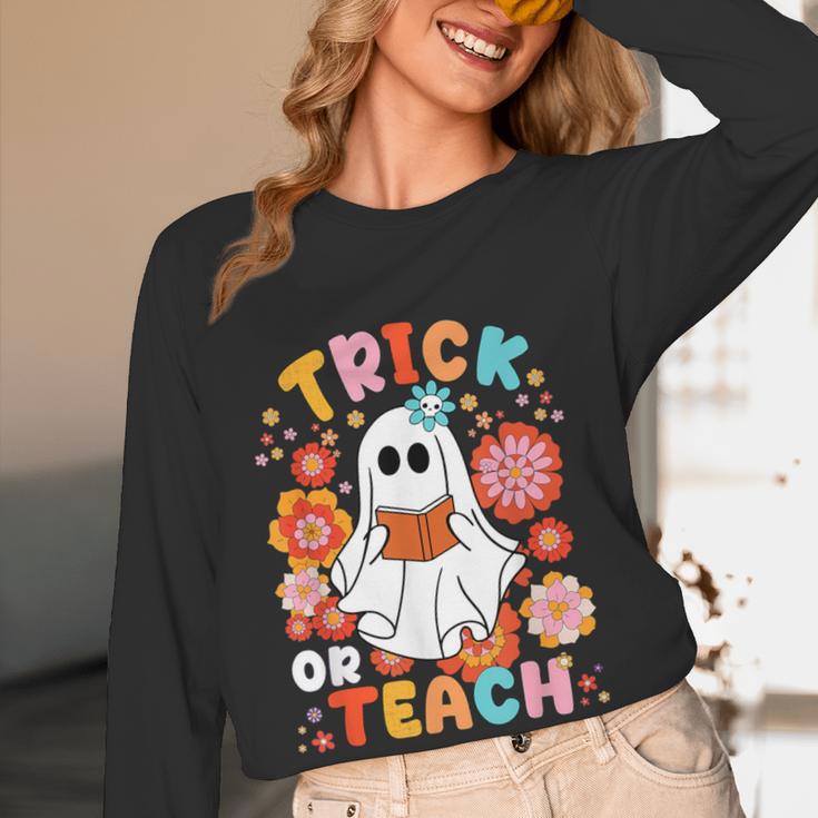 Groovy Halloween Trick Or Teach Retro Floral Ghost Teacher For Men Women Kids Women Long Sleeve T-Shirt, novelty gifts, funny gifts Groovy Halloween Trick Or Teach Retro Floral Ghost Teacher For Men Women Kids Women Long Sleeve T-Shirt, novelty gifts, funny gifts
