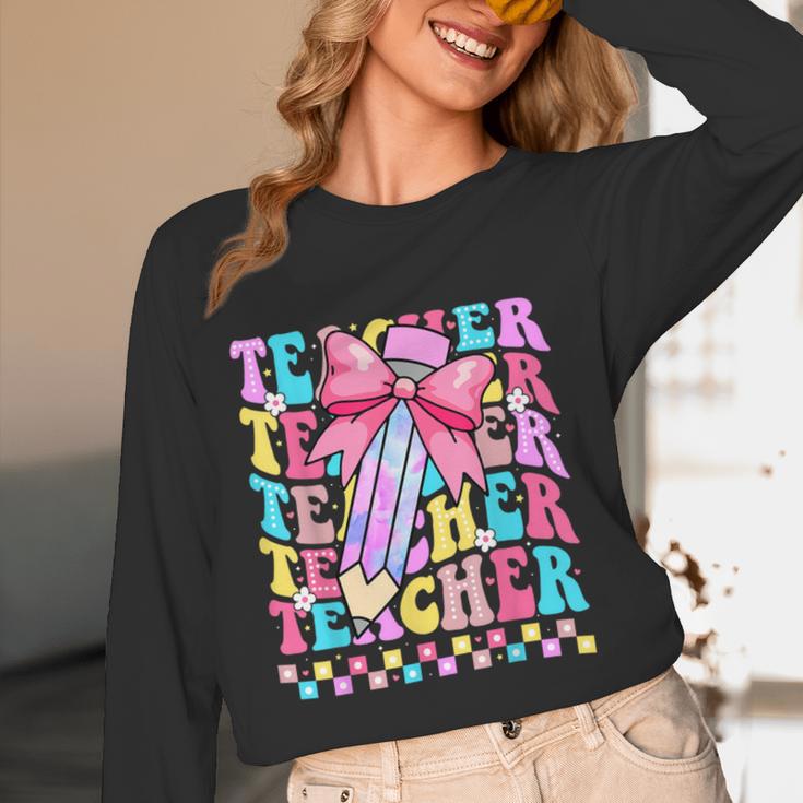 Groovy Teacher Cute Coquette Bow Flower Retro Back To School Women Long Sleeve T-Shirt, novelty gifts, funny gifts Groovy Teacher Cute Coquette Bow Flower Retro Back To School Women Long Sleeve T-Shirt, novelty gifts, funny gifts