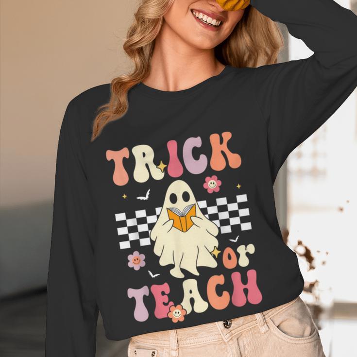 Groovy Teacher Halloween Retro Trick Or Teach Floral Ghost Women Long Sleeve T-Shirt, novelty gifts, funny gifts
