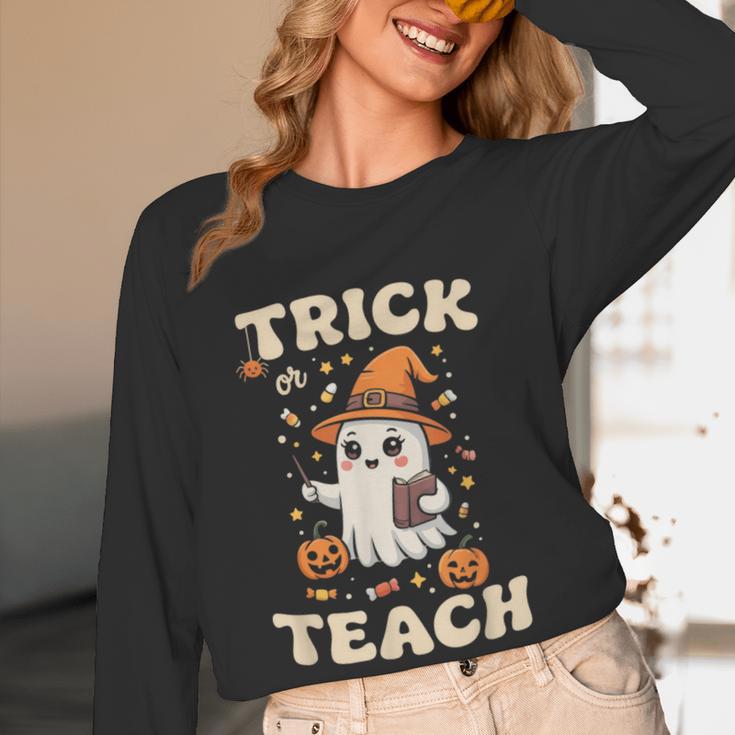 Halloween Teacher Shirts Women School Trick Or Teach Groovy Women Long Sleeve T-Shirt, novelty gifts, funny gifts