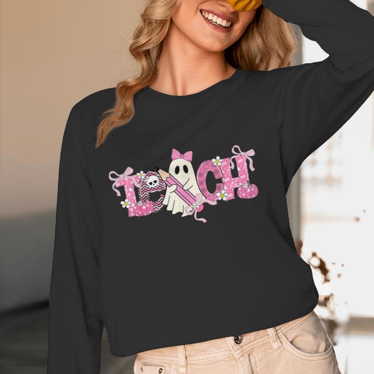 Pink Ghost Teach Halloween Teacher In Spooky Season Women Long Sleeve T-Shirt, novelty gifts, funny gifts Pink Ghost Teach Halloween Teacher In Spooky Season Women Long Sleeve T-Shirt, novelty gifts, funny gifts