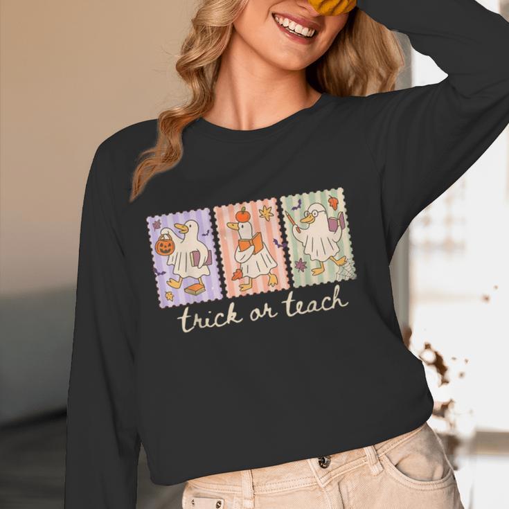 Preppy Goose Teacher Trick Or Teach Halloween Teacher Goose Women Long Sleeve T-Shirt, novelty gifts, funny gifts