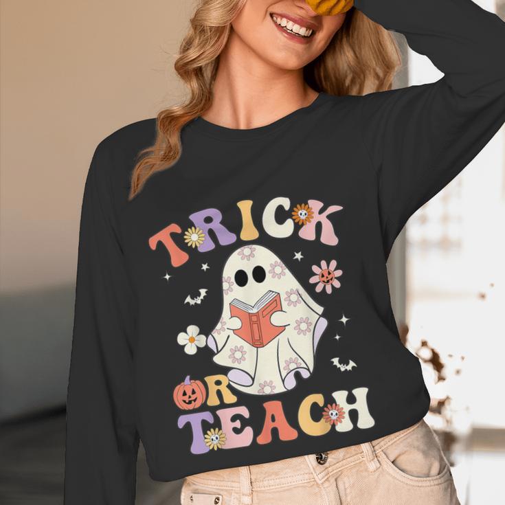 Teacher Halloween Trick Or Teach Floral Ghost Women Long Sleeve T-Shirt, novelty gifts, funny gifts Teacher Halloween Trick Or Teach Floral Ghost Women Long Sleeve T-Shirt, novelty gifts, funny gifts