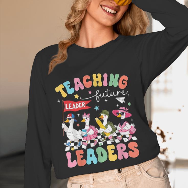 Teaching Future Leaders Groovy Teacher Back To School Women Long Sleeve T-Shirt, novelty gifts, funny gifts
