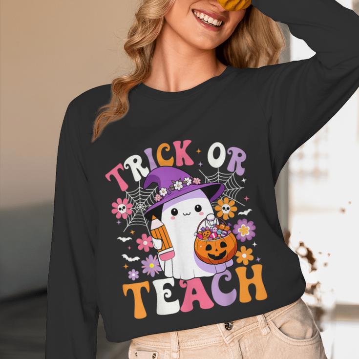 Trick Or Teach Groovy Teacher Ghost Halloween Teacher Women Long Sleeve T-Shirt, novelty gifts, funny gifts Trick Or Teach Groovy Teacher Ghost Halloween Teacher Women Long Sleeve T-Shirt, novelty gifts, funny gifts