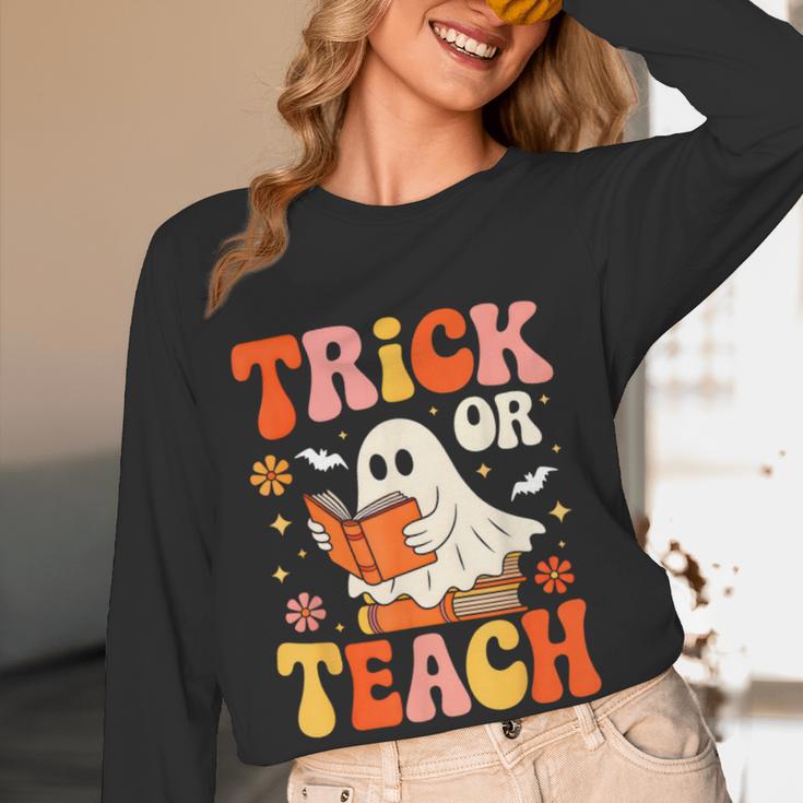 Trick Or Teach Halloween Shirt For Teacher Kids Floral Ghost Women Long Sleeve T-Shirt, novelty gifts, funny gifts Trick Or Teach Halloween Shirt For Teacher Kids Floral Ghost Women Long Sleeve T-Shirt, novelty gifts, funny gifts