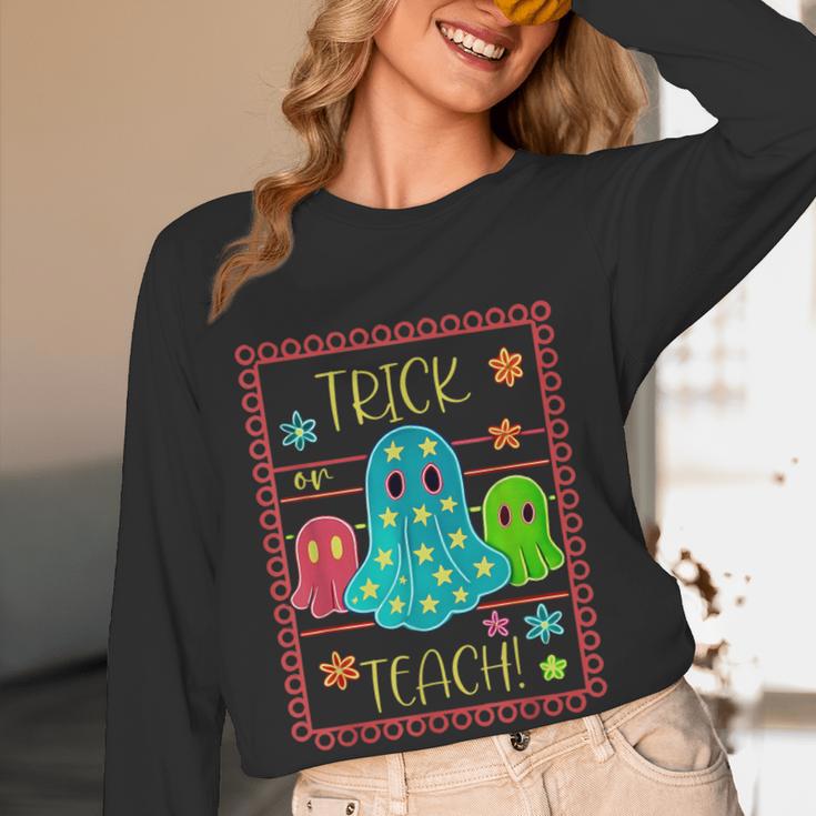Trick Or Teach Neon Ghost Flower Teacher Spooky Halloween Women Long Sleeve T-Shirt, novelty gifts, funny gifts Trick Or Teach Neon Ghost Flower Teacher Spooky Halloween Women Long Sleeve T-Shirt, novelty gifts, funny gifts