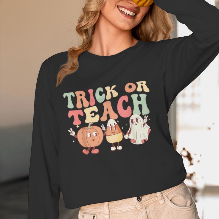 Trick Or Teach Pumpkin Candy Corn Ghost Halloween Teacher Women Long Sleeve T-Shirt, novelty gifts, funny gifts Trick Or Teach Pumpkin Candy Corn Ghost Halloween Teacher Women Long Sleeve T-Shirt, novelty gifts, funny gifts