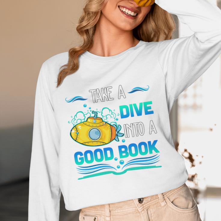 Librarian Teacher Dive Into A Good Book Reading Premium Tri-Blend Women Long Sleeve T-Shirt, novelty gifts, funny gifts