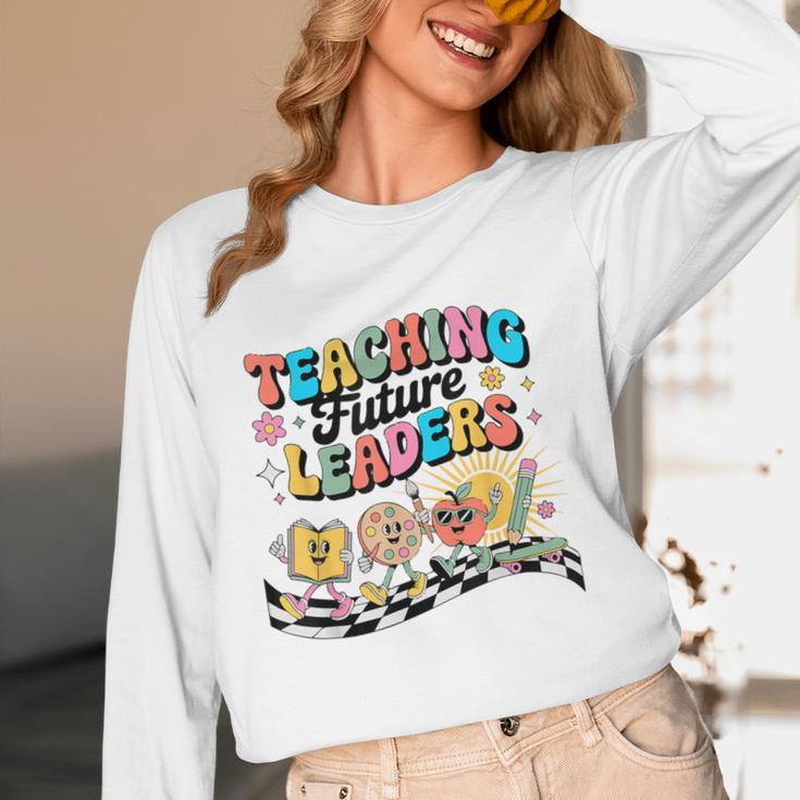 Retro Teaching Future Leaders Groovy Teacher Back To School Women Long Sleeve T-Shirt, novelty gifts, funny gifts