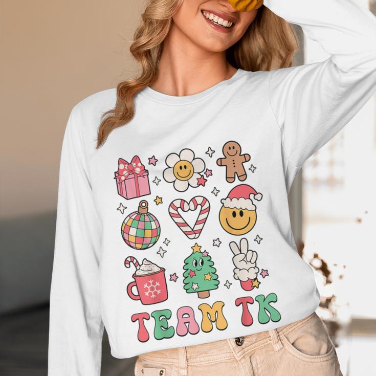 Team TK Teacher Christmas Groovy Smile Face Girl Boy Kid TK Women Long Sleeve T-Shirt, novelty gifts, funny gifts Team TK Teacher Christmas Groovy Smile Face Girl Boy Kid TK Women Long Sleeve T-Shirt, novelty gifts, funny gifts