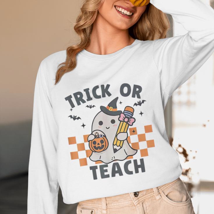 Trick Or Teach Teacher Women Long Sleeve T-Shirt, novelty gifts, funny gifts Trick Or Teach Teacher Women Long Sleeve T-Shirt, novelty gifts, funny gifts