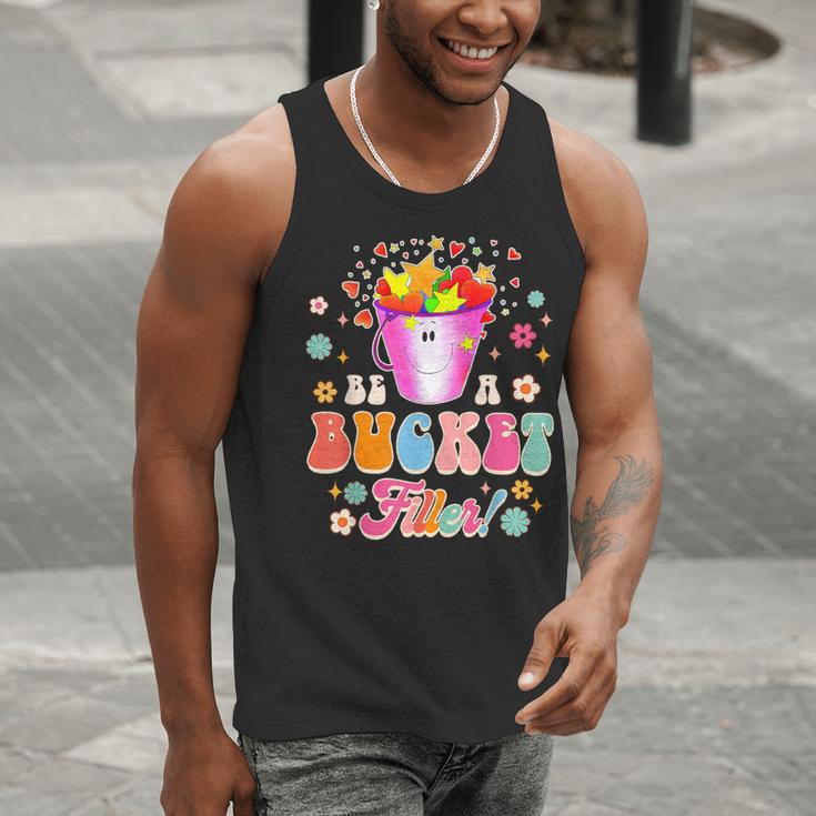 Be A Bucket Filler Teacher Teaching Groovy Back To School For Men Women Men Tank Top, Groovy Teacher Tank Tops, funny gift Be A Bucket Filler Teacher Teaching Groovy Back To School For Men Women Men Tank Top, Groovy Teacher Tank Tops, funny gift