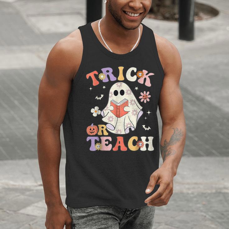 Groovy Halloween Trick Or Teach Retro Floral Ghost Teacher Men Tank Top, Groovy Teacher Tank Tops, funny gift Groovy Halloween Trick Or Teach Retro Floral Ghost Teacher Men Tank Top, Groovy Teacher Tank Tops, funny gift
